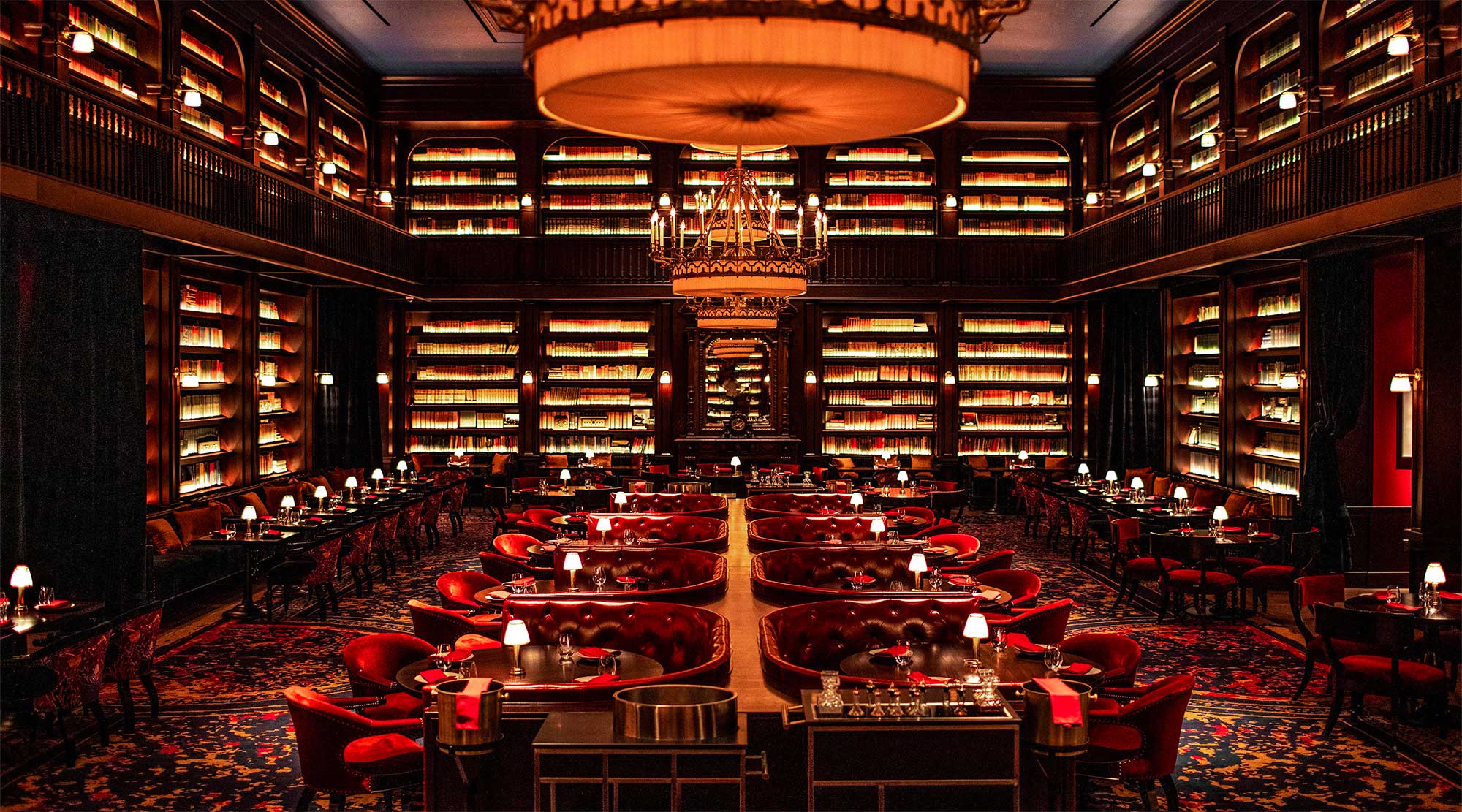 Restaurant with bookshelves along the walls.