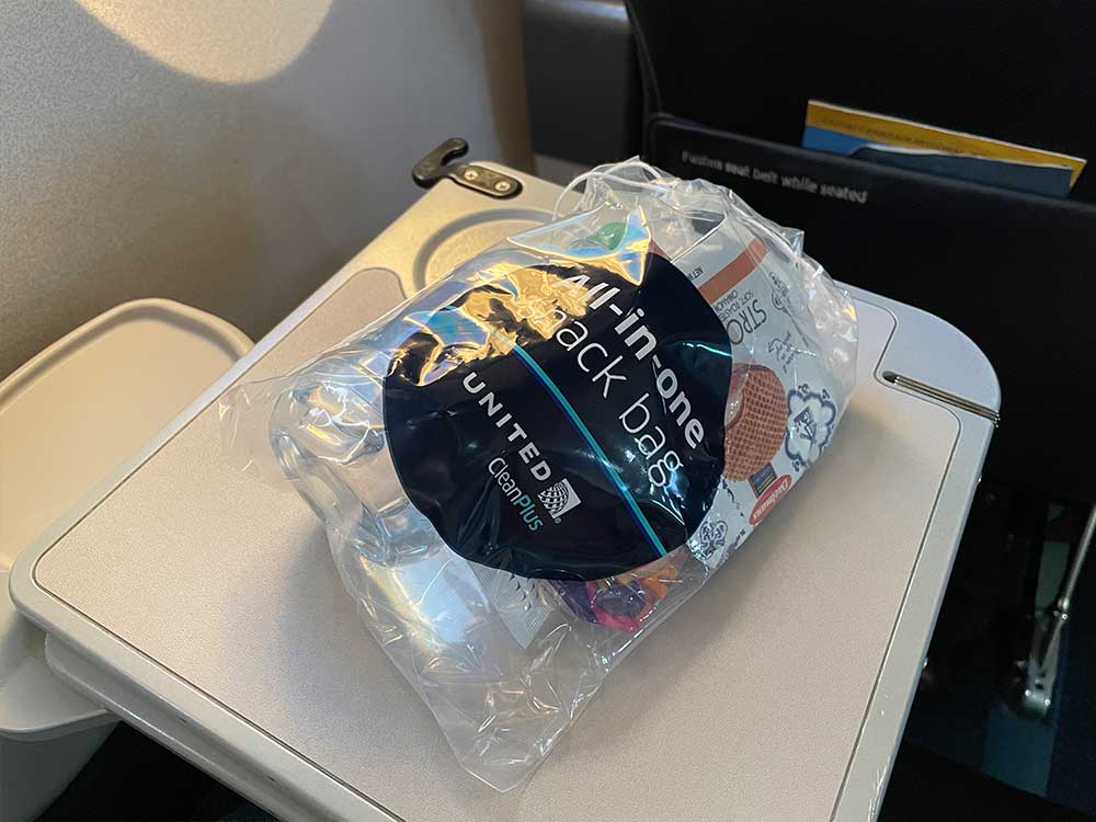 Plastic bag of snacks given to each passenger on United.