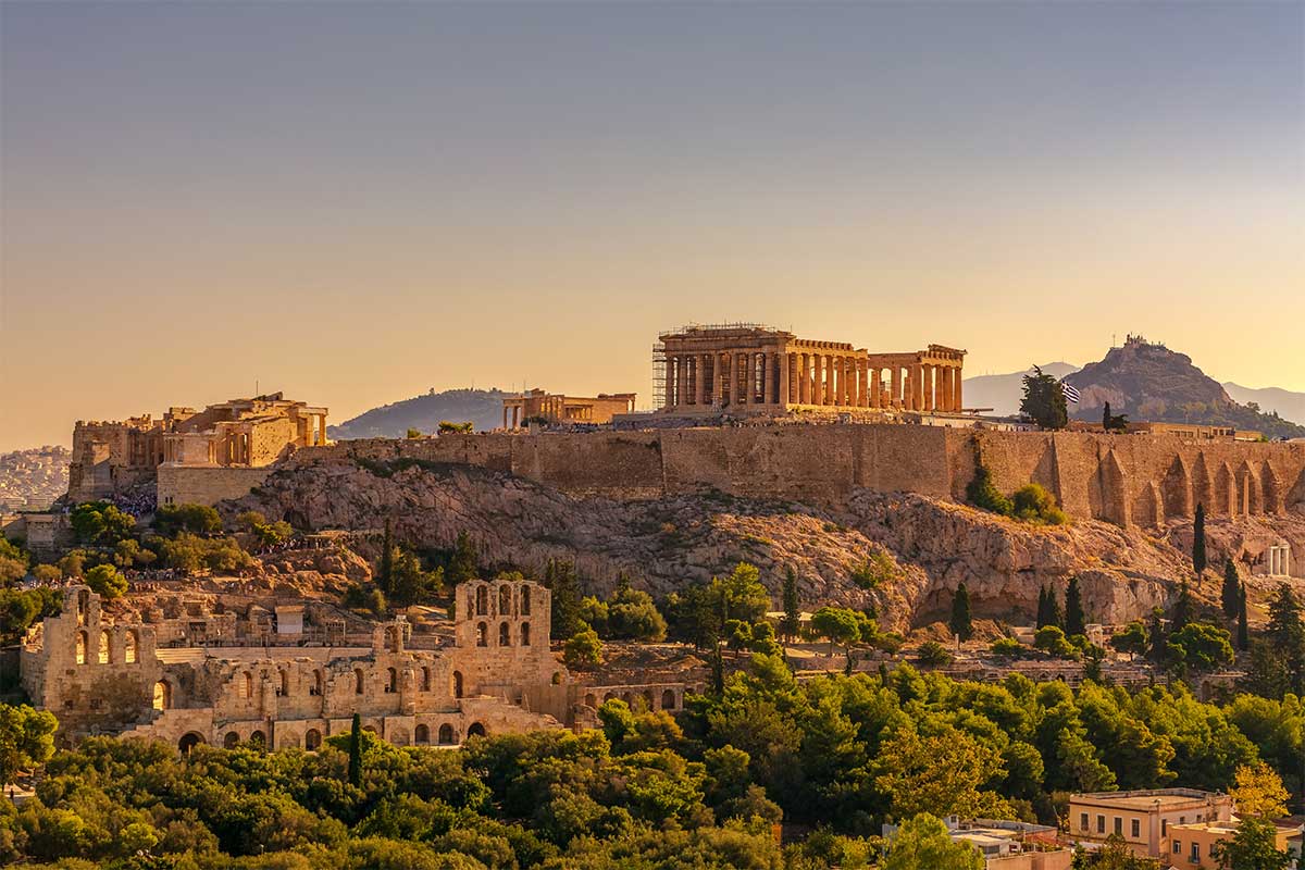 Acropolis Athens seen from a distance at sunset.