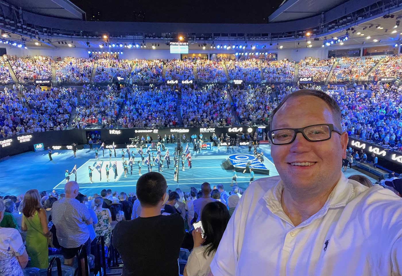 John taking a selfie in front of the tennis court at Rod Laver Arena following the women's final match.