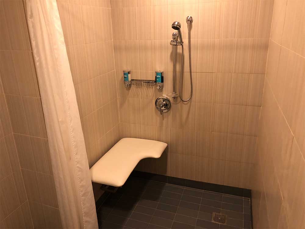 Roll-in shower without grab bars.