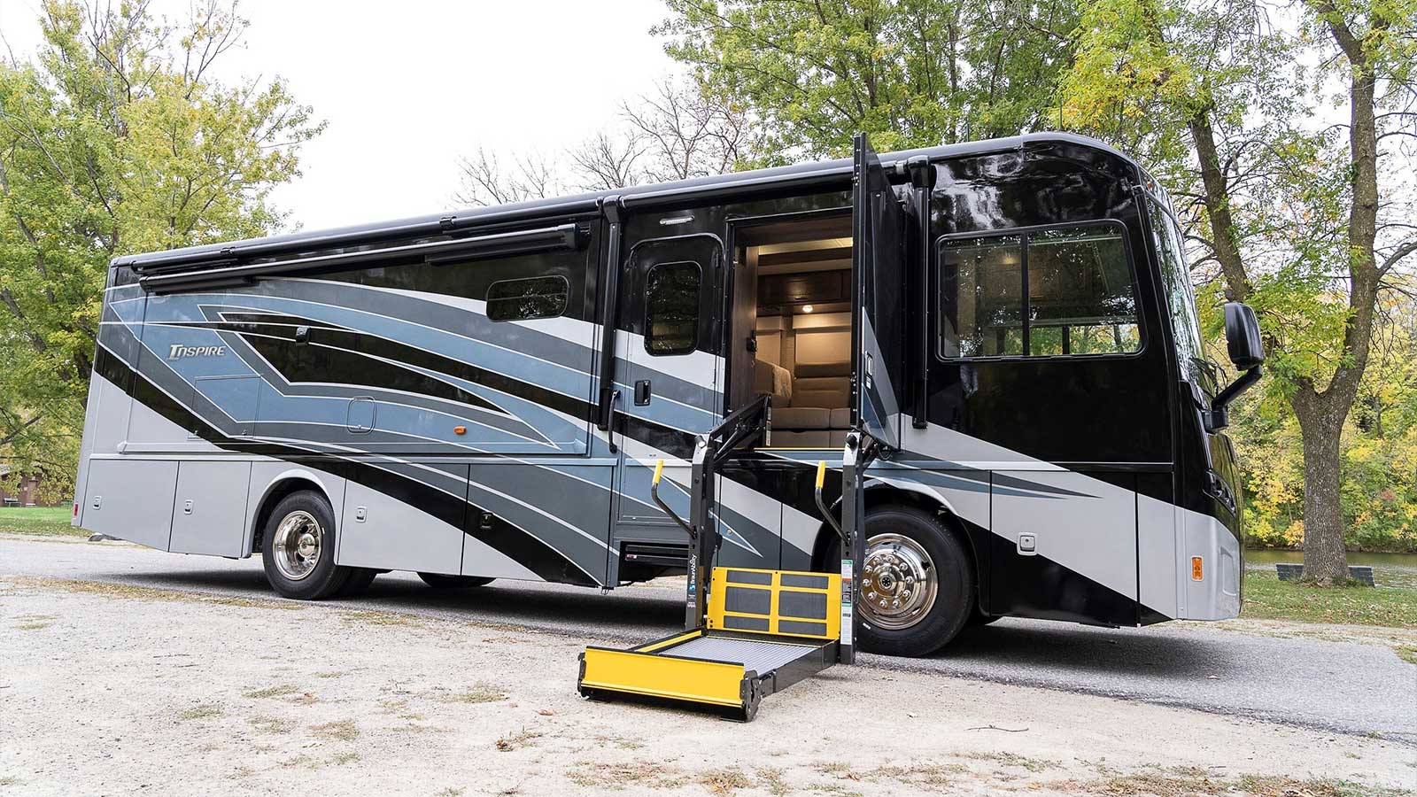 Exterior of Winnebago Inspire with wheelchair lift deployed.