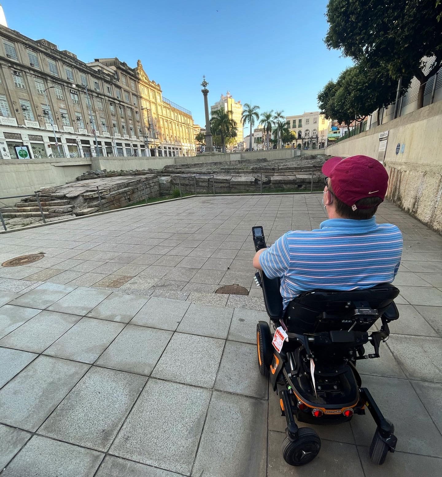 John in his wheelchair looking at an excavated dock.