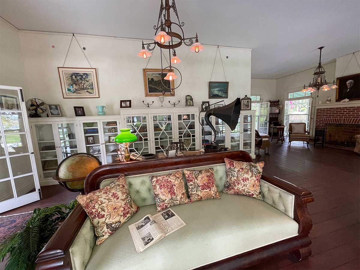 Living room area with original gramophone and light fixtures designed by Thomas Edison.