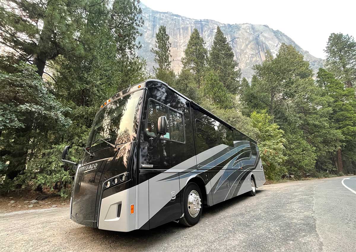 Winnebago Inspire RV parked in front of El Capitan Mountain in Yosemite National Park.