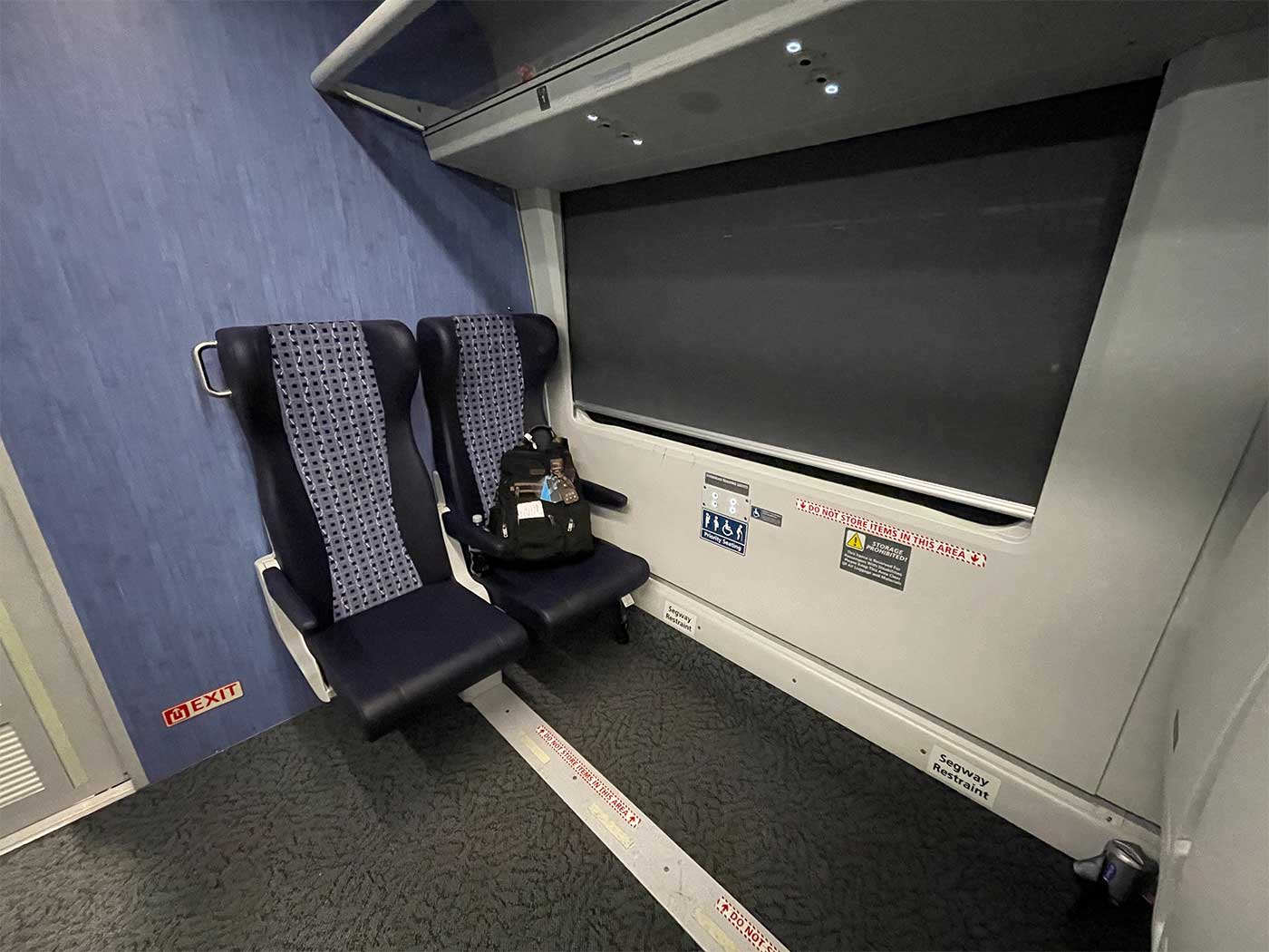 Large space for wheelchair on train.