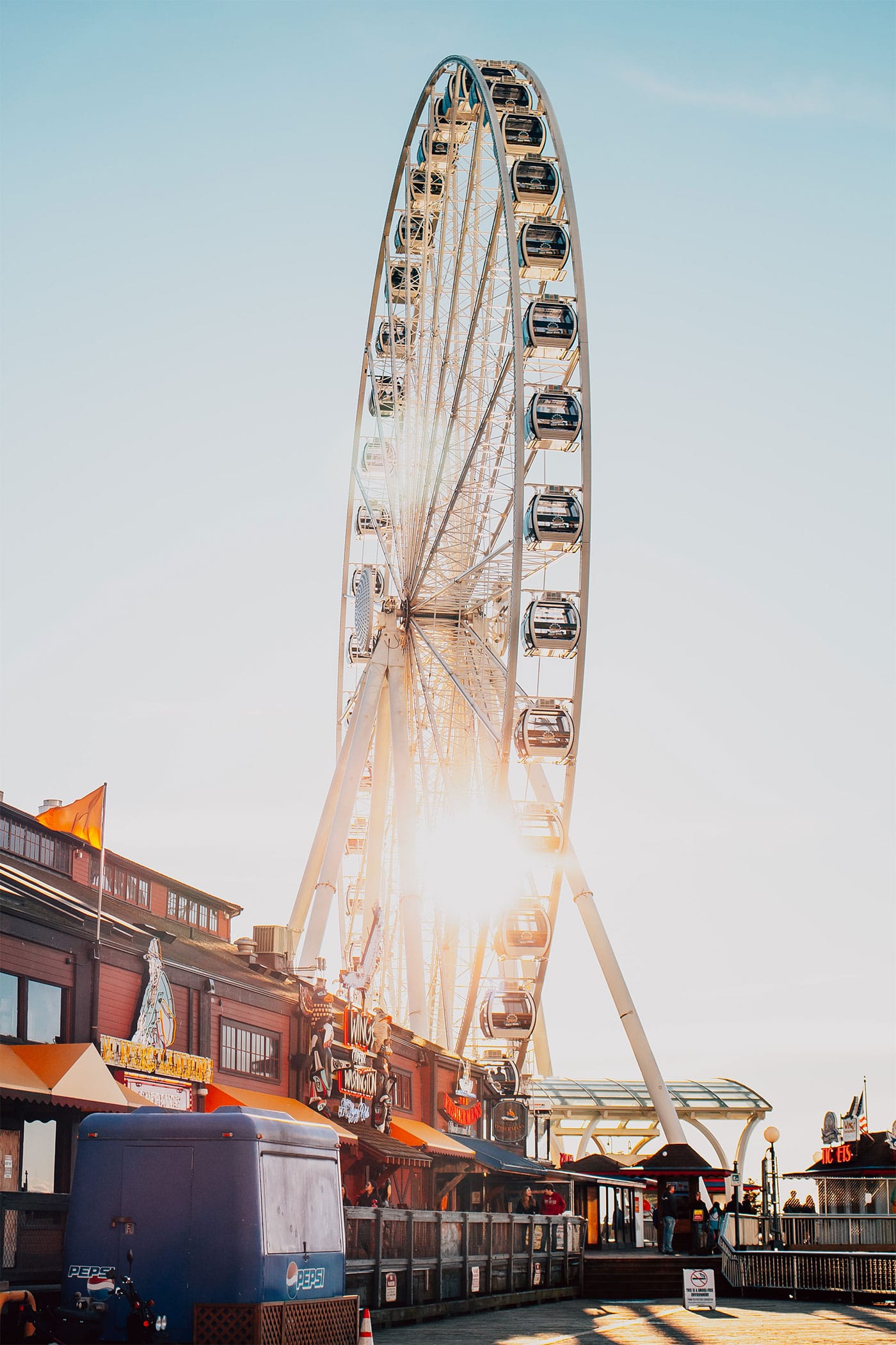 Seattle Great Wheel sits atop a pier on the waterfront.