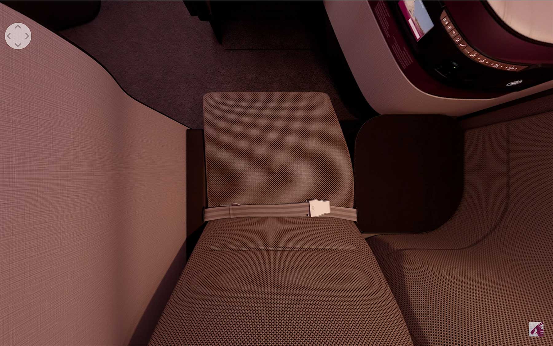 Aerial illustration of QSuite showing wall extending almost the entire depth of the seat cushion.