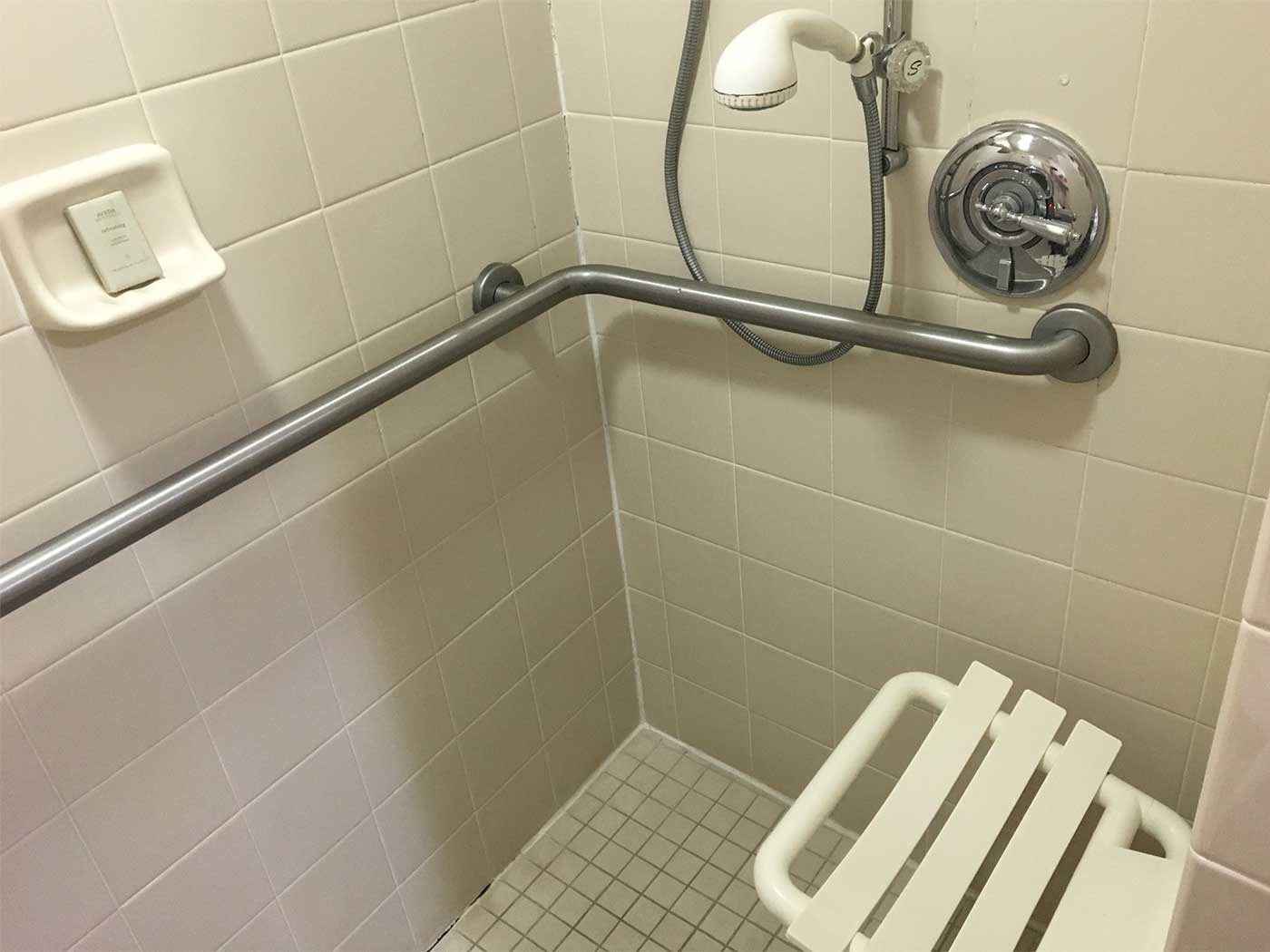 Roll-in shower with built-in seat.