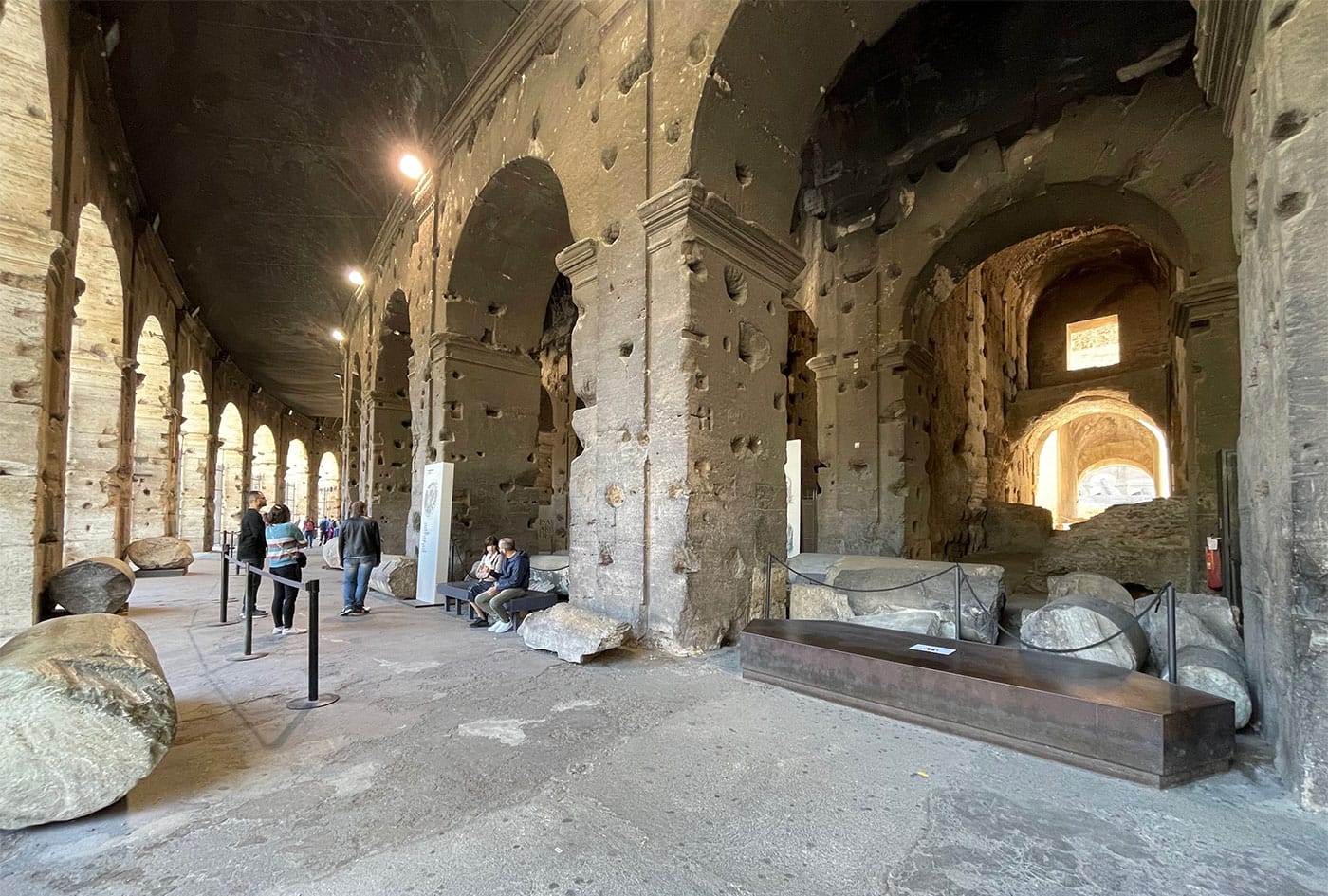 Interior corridor of the Colosseum, with stone floor.