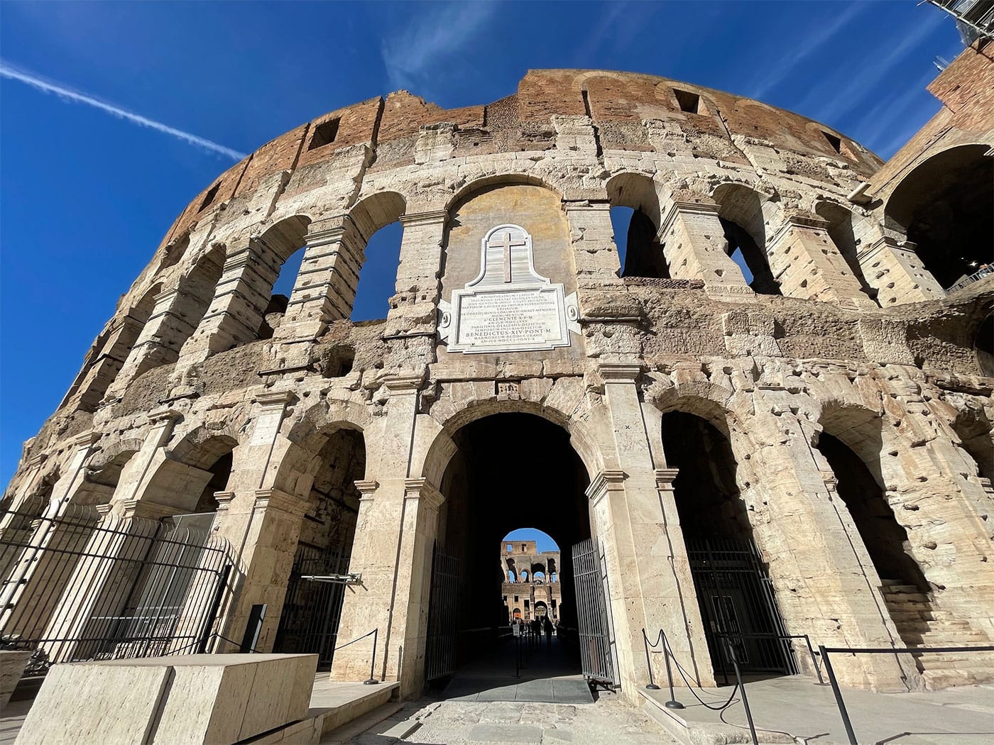 Arched entrance into the Colosseum arena from the exterior.