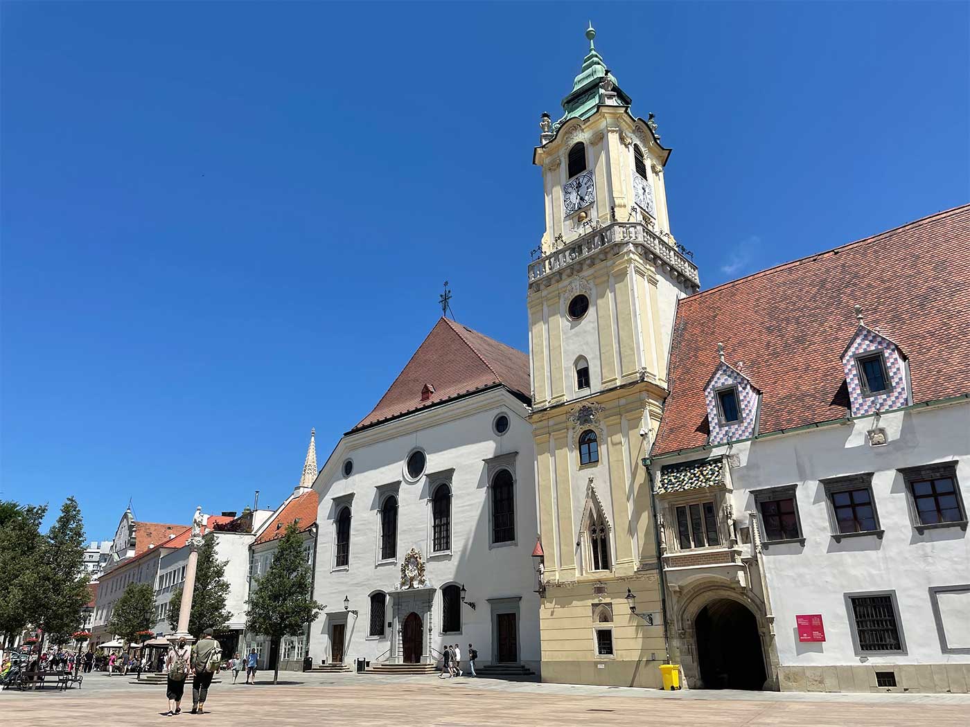 Town hall building with imposing clock tower.