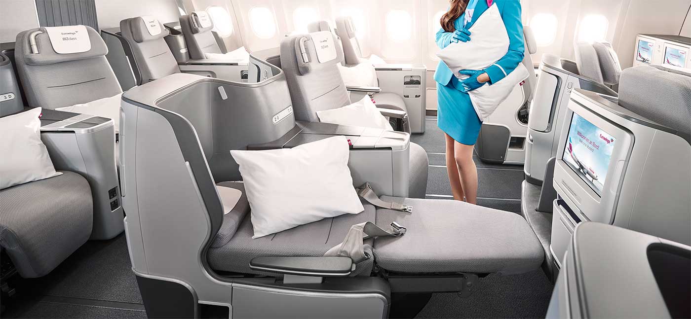 Business class seat in flat bed mode.