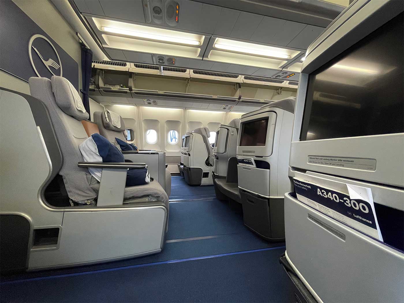 Business class seat seen from the side.