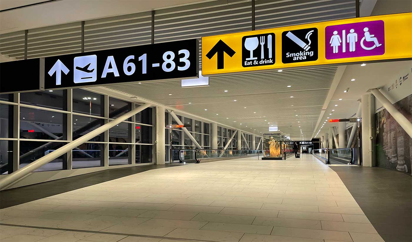 Interior corridor at Rome airport terminal.