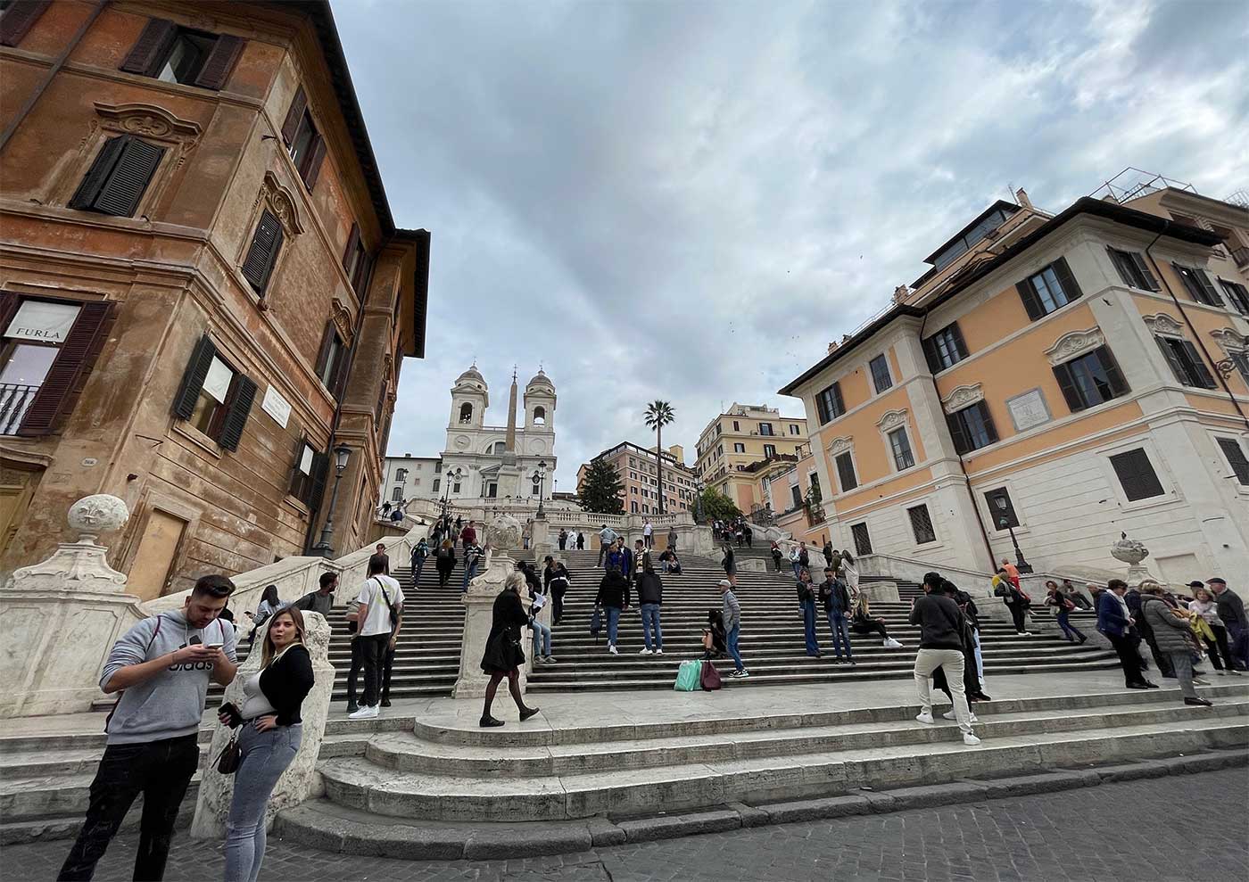 Large staircase leading up towards a church on a hilltop.