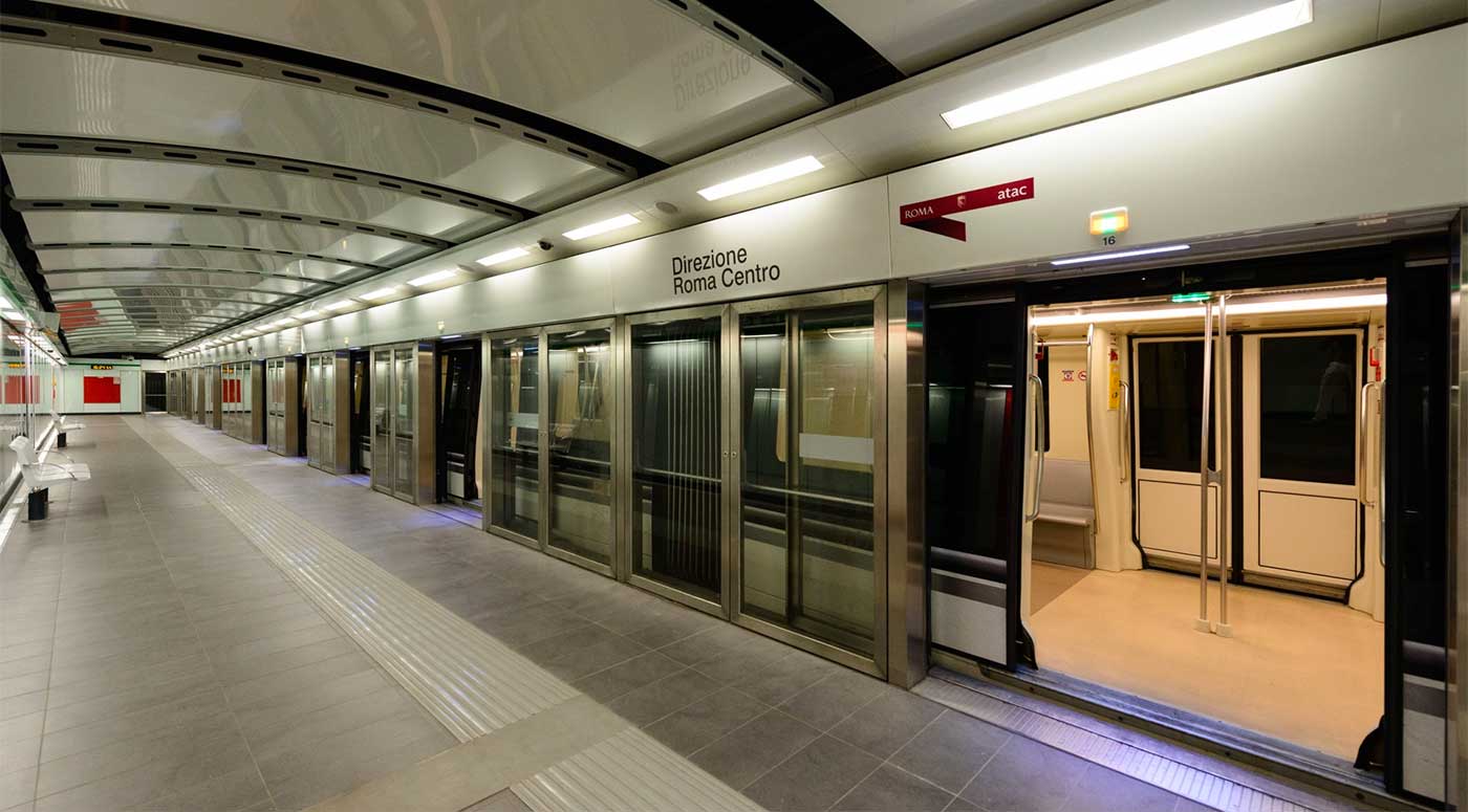 Metro train parked at subway station in Rome.