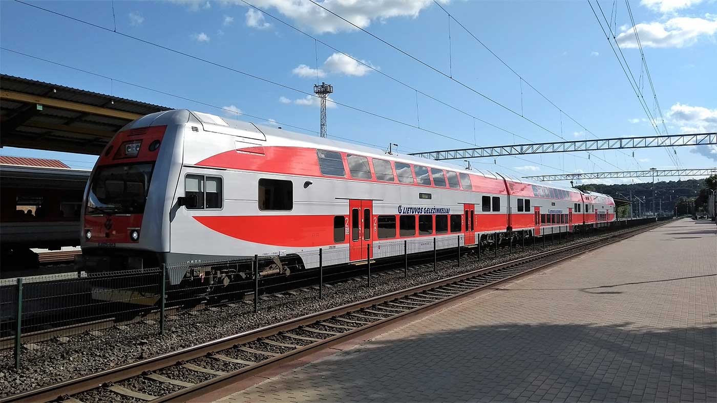 Passenger train at rail station.