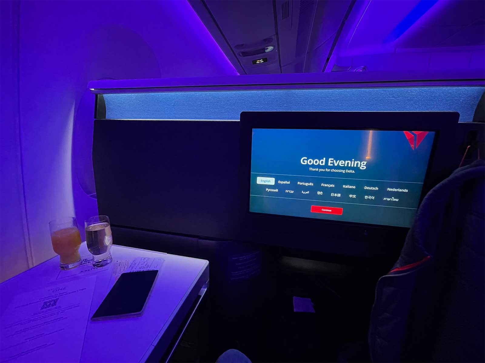 Wide angle view of seating area with pre-departure beverages.