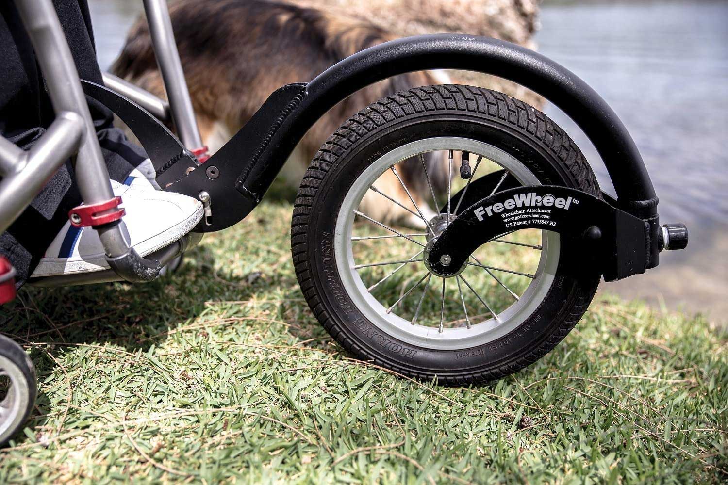 Big wheel attachment for manual wheelchair.