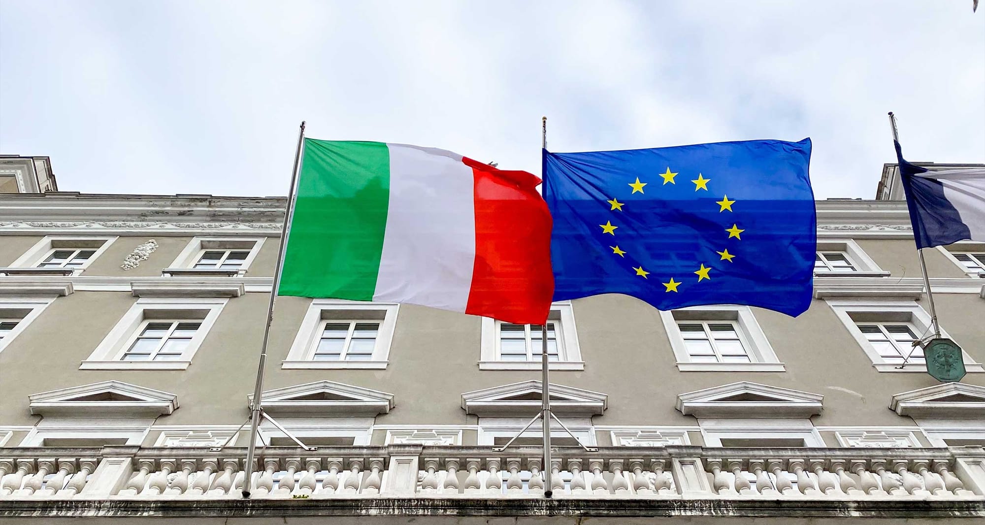 Flags of Italy and the European Union.