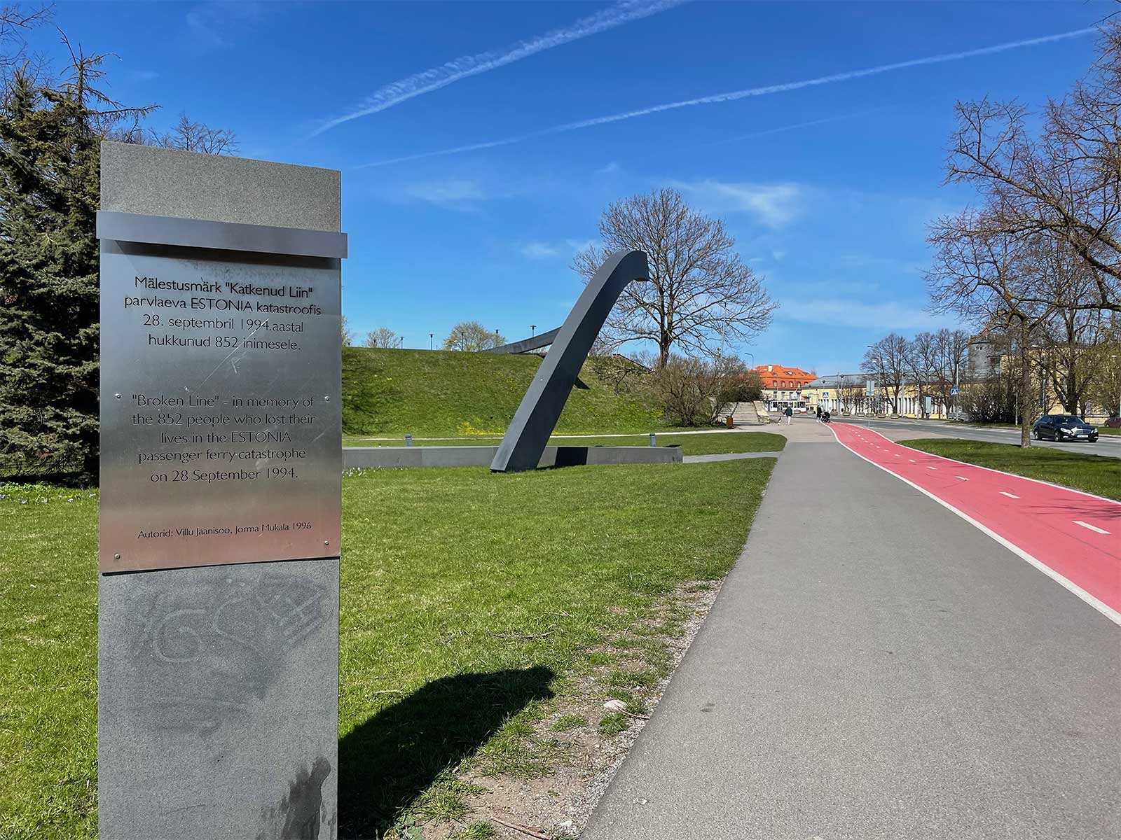 Bicycle lane alongside public park and green space in Tallinn.