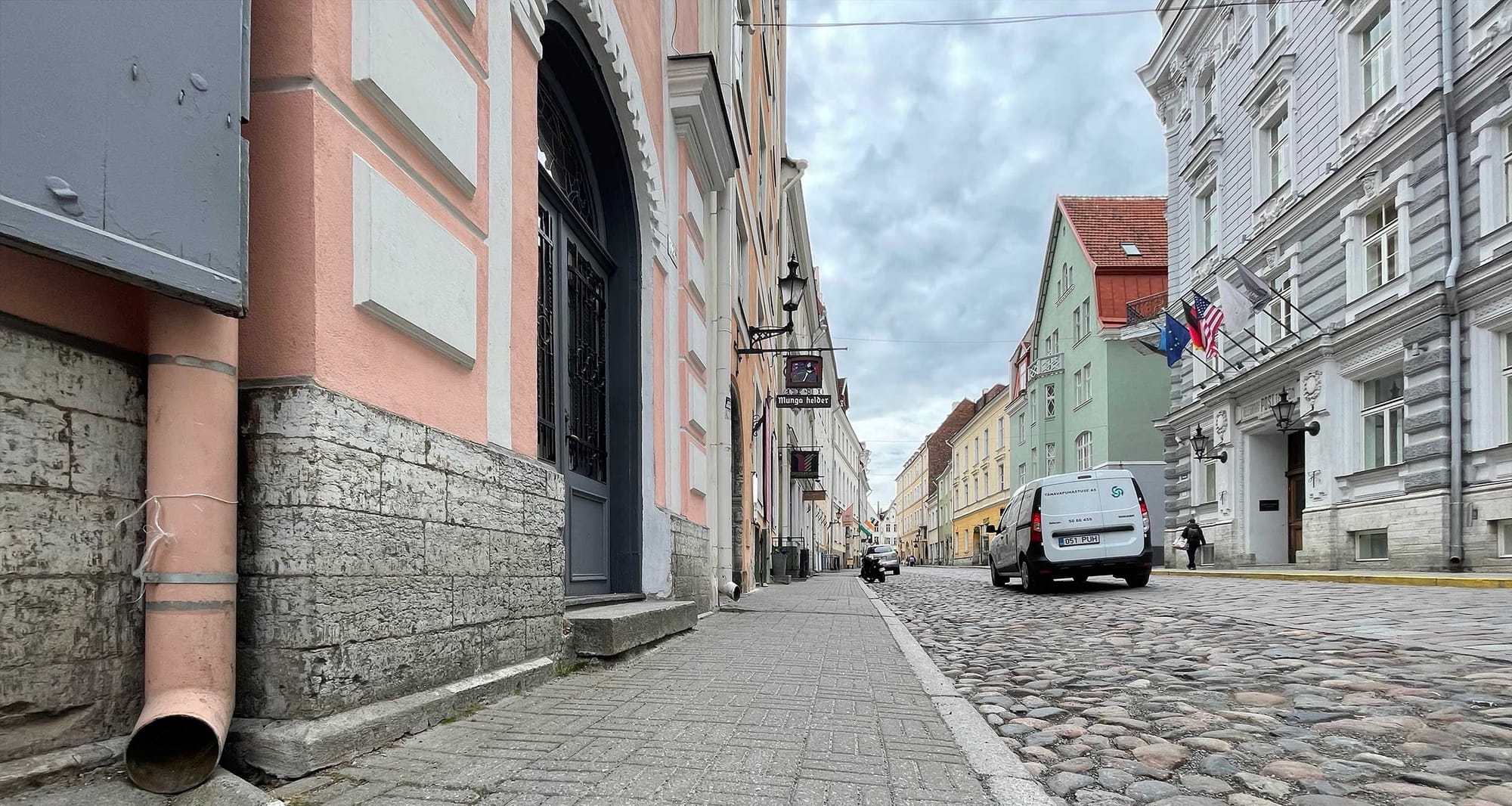 Cobblestone street next to sidewalk in Tallinn.