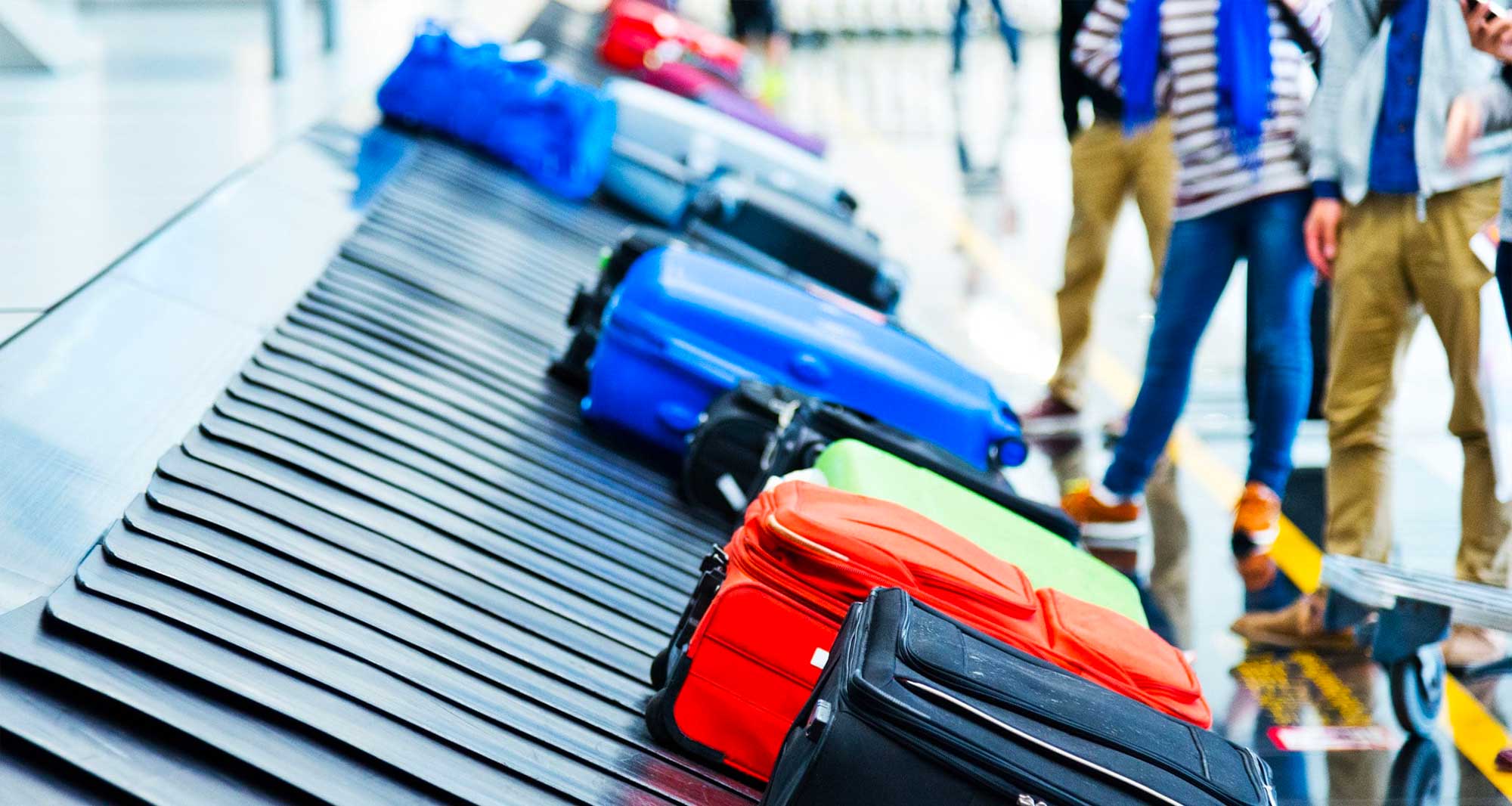 Luggage on an airport baggage carousel.