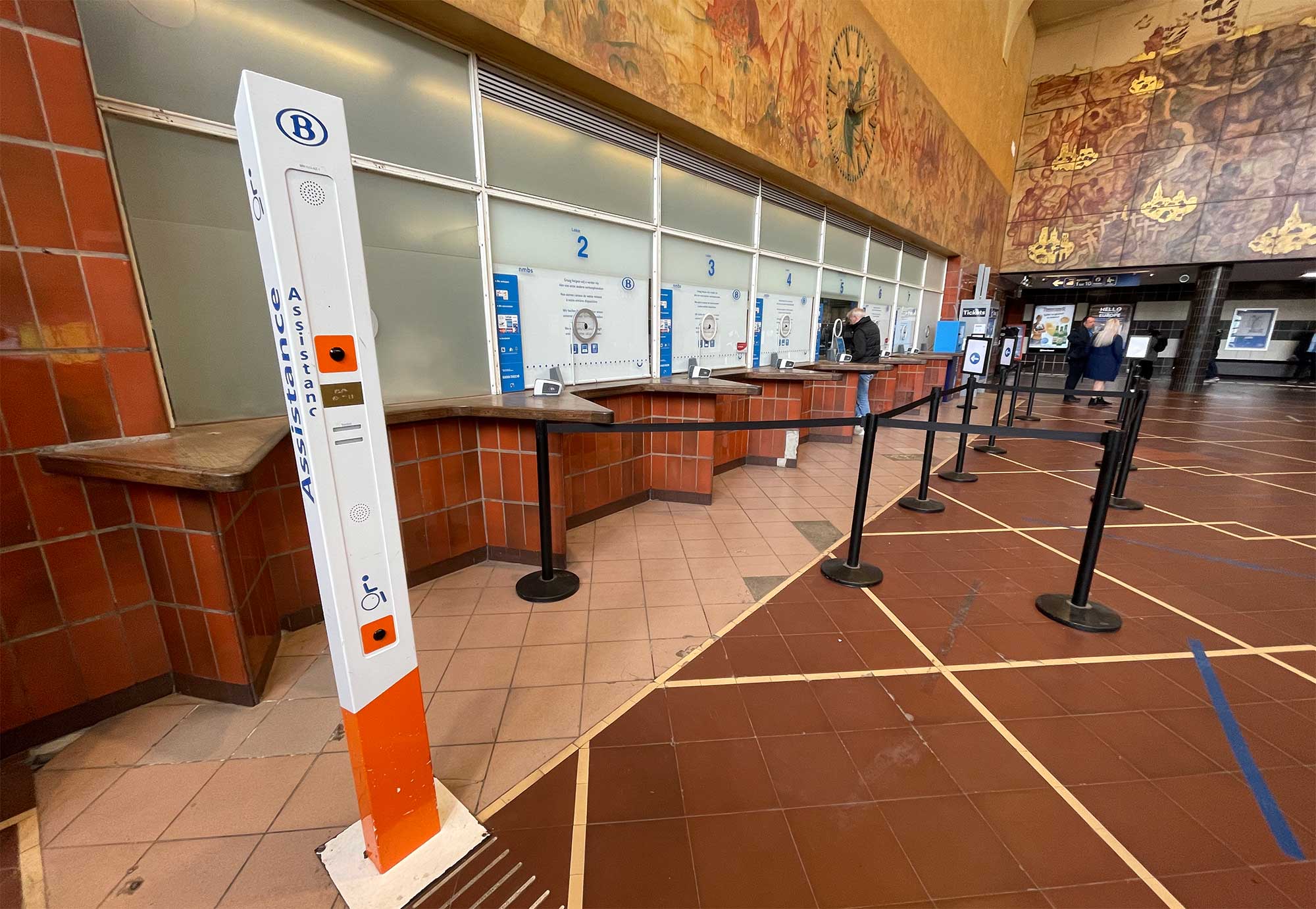 Meeting point for wheelchair assistance inside train station.