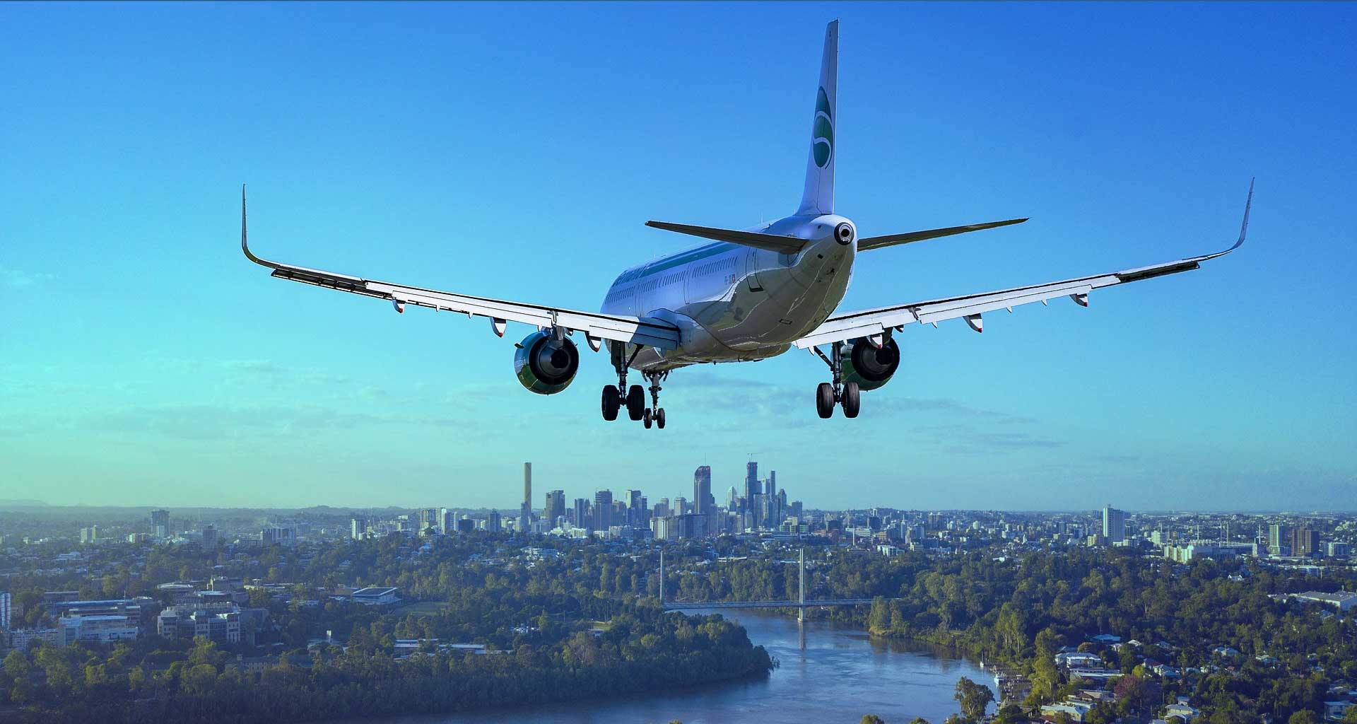 Airplane with gear extended on final approach.