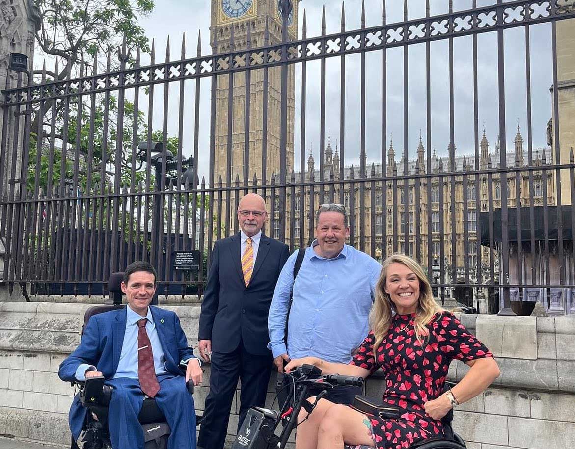 Rights on Flights team pictured outside of Parliament building.