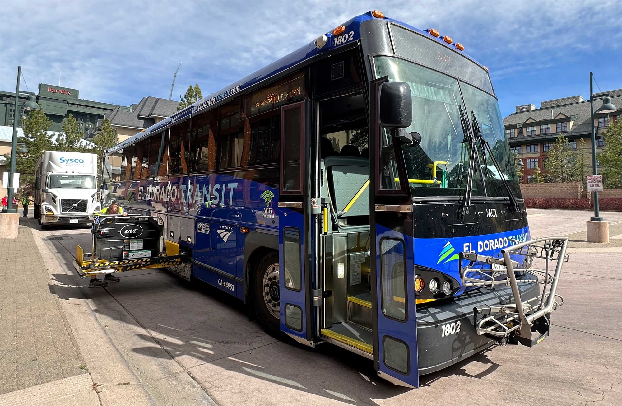 Amtrak Thruway bus with wheelchair lift extended.