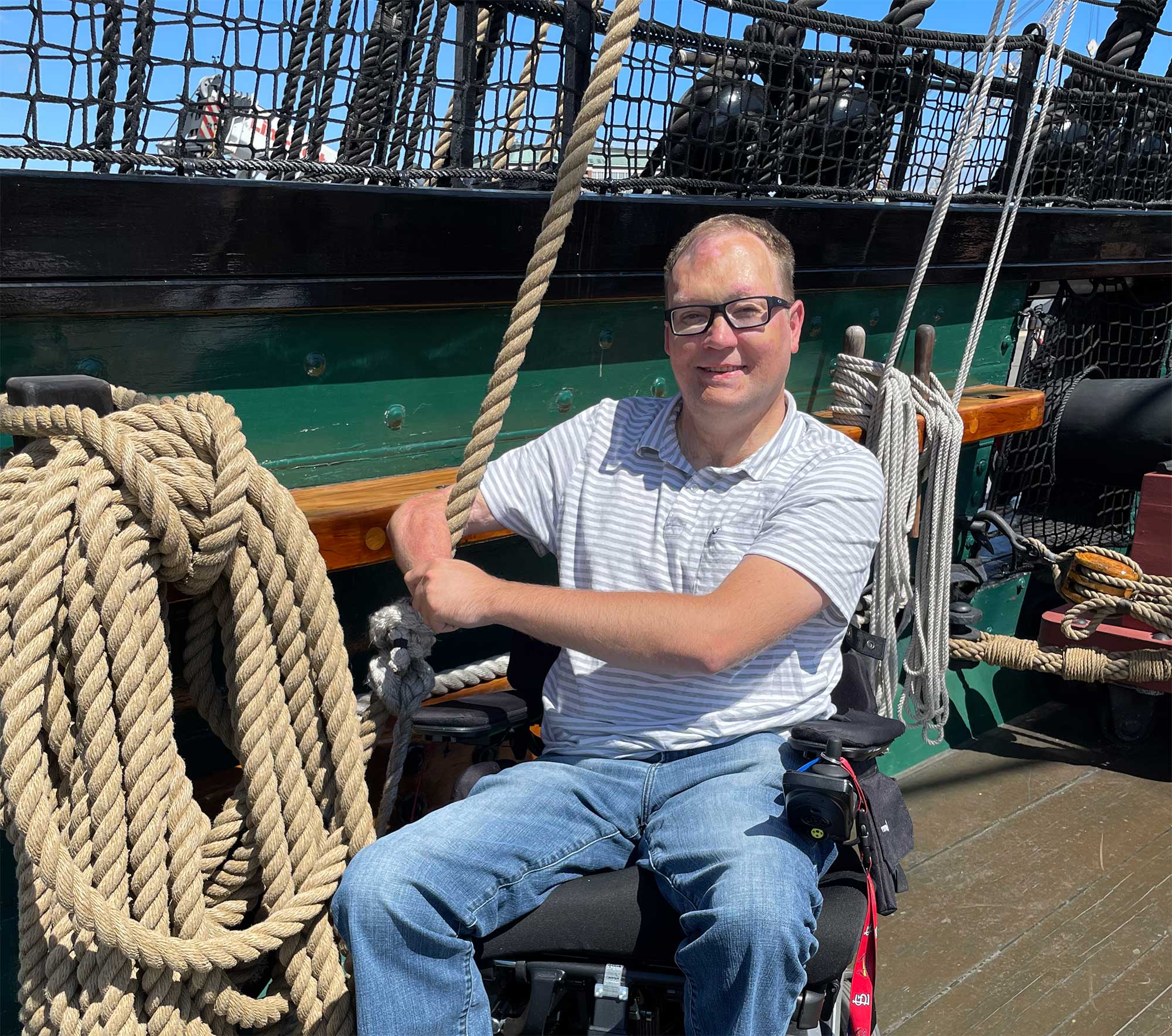 John pictured on the deck of the USS Constitution naval ship, known as Old Ironsides.