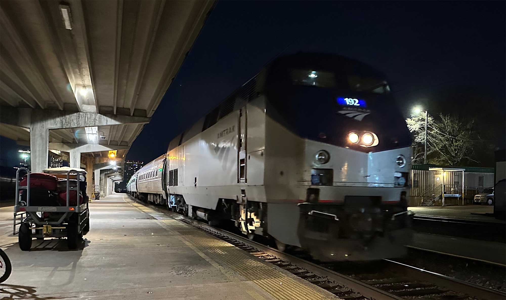 Amtrak train arriving at Charlotte station.