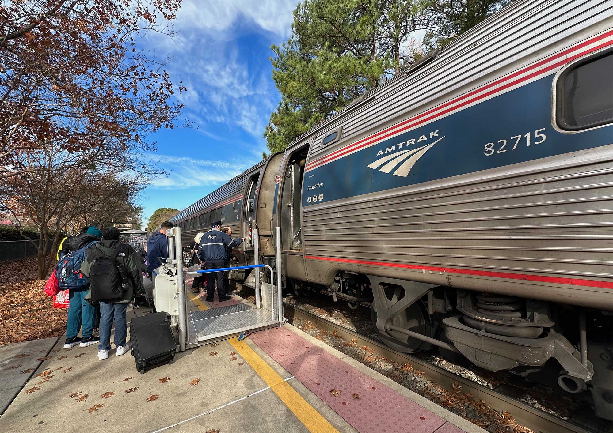 Wheelchair lift for boarding on train platform.