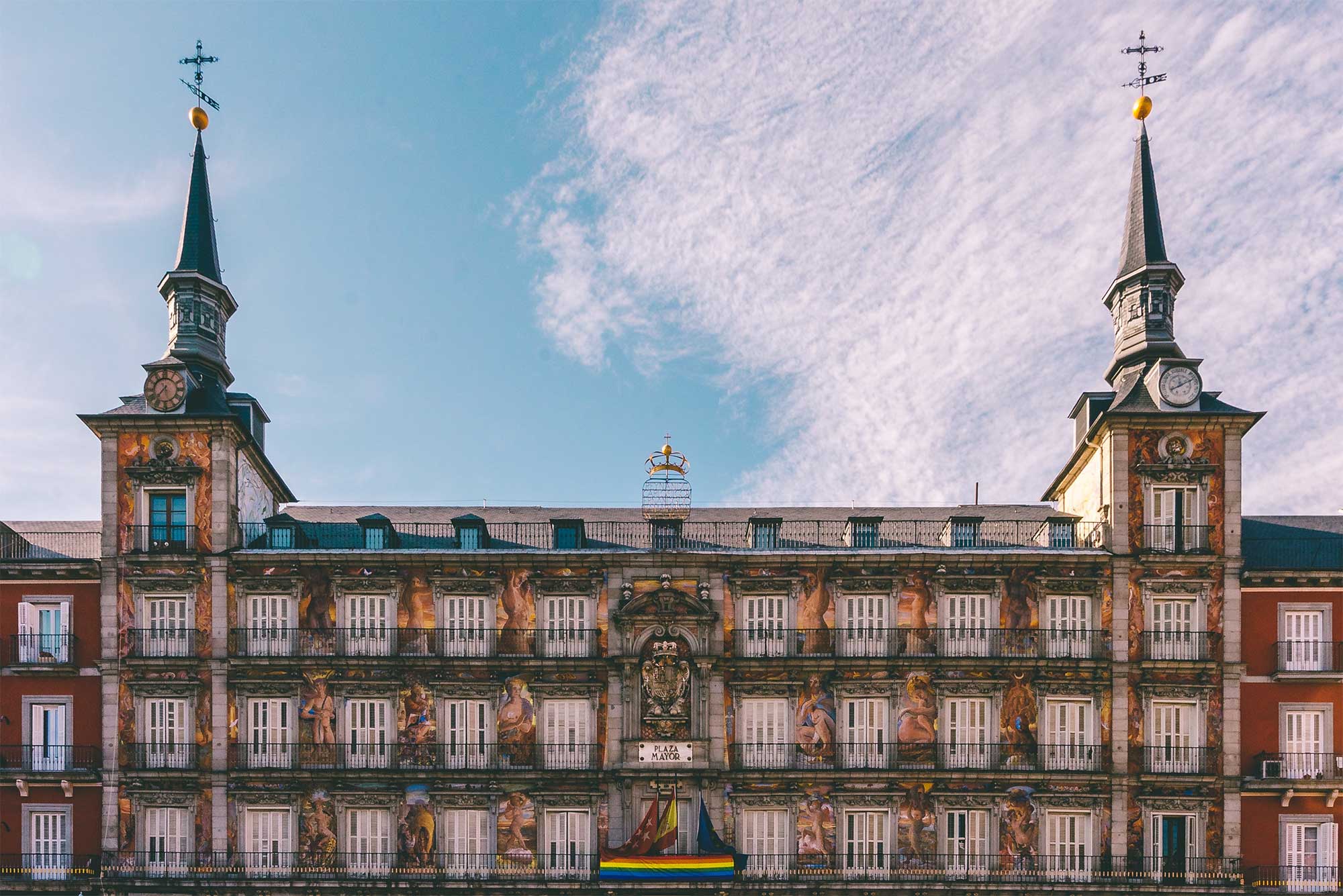 Cultural building with two towers on Plaza Mayor.