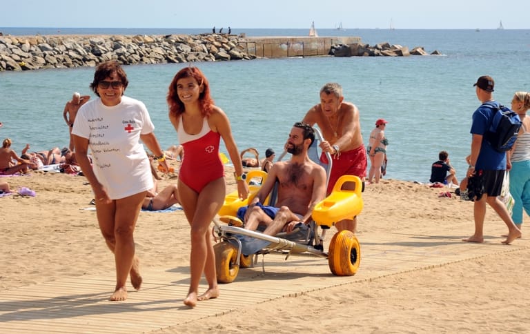 Beach wheelchair in Barcelona beach.