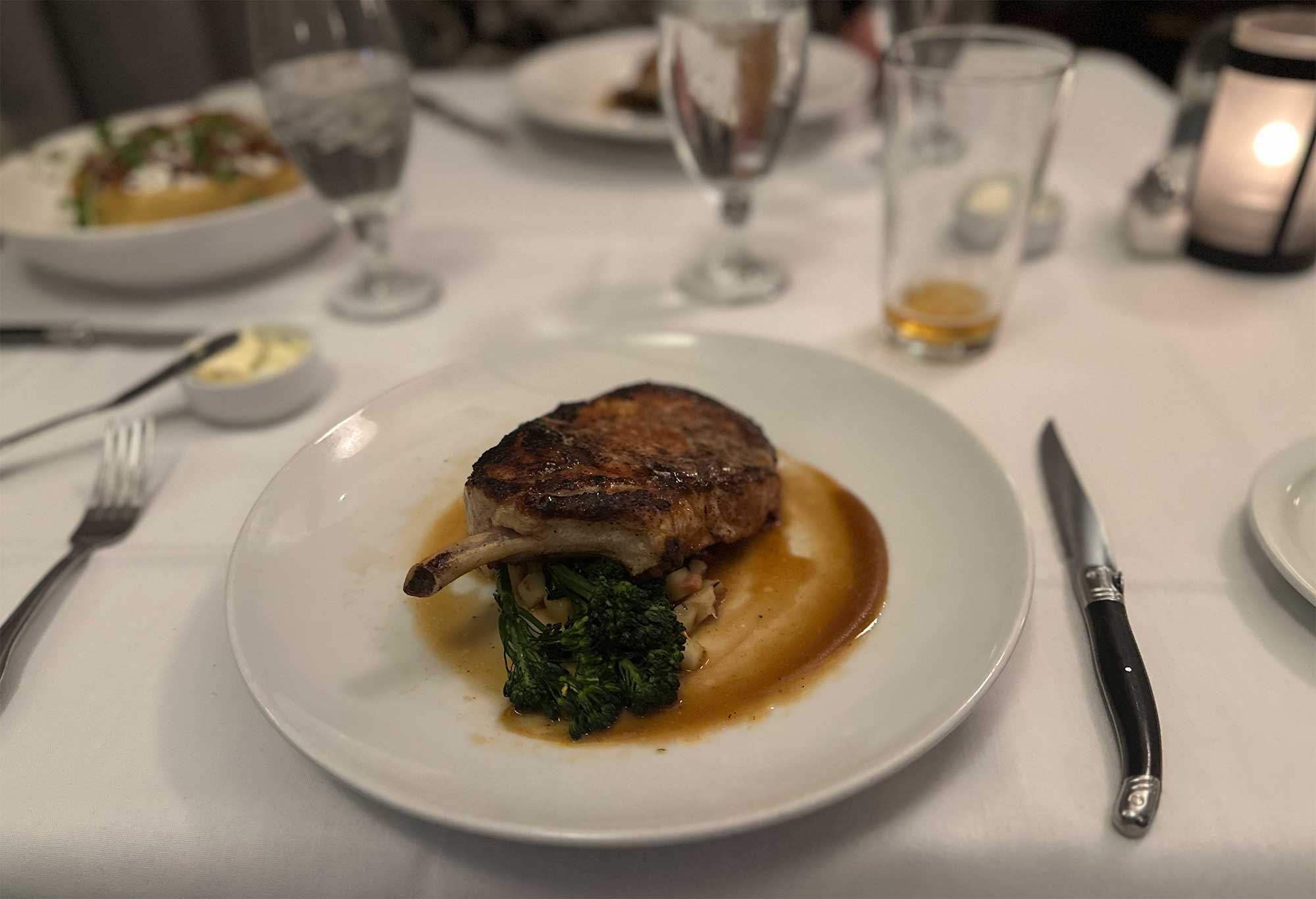 Pork chop with greens.