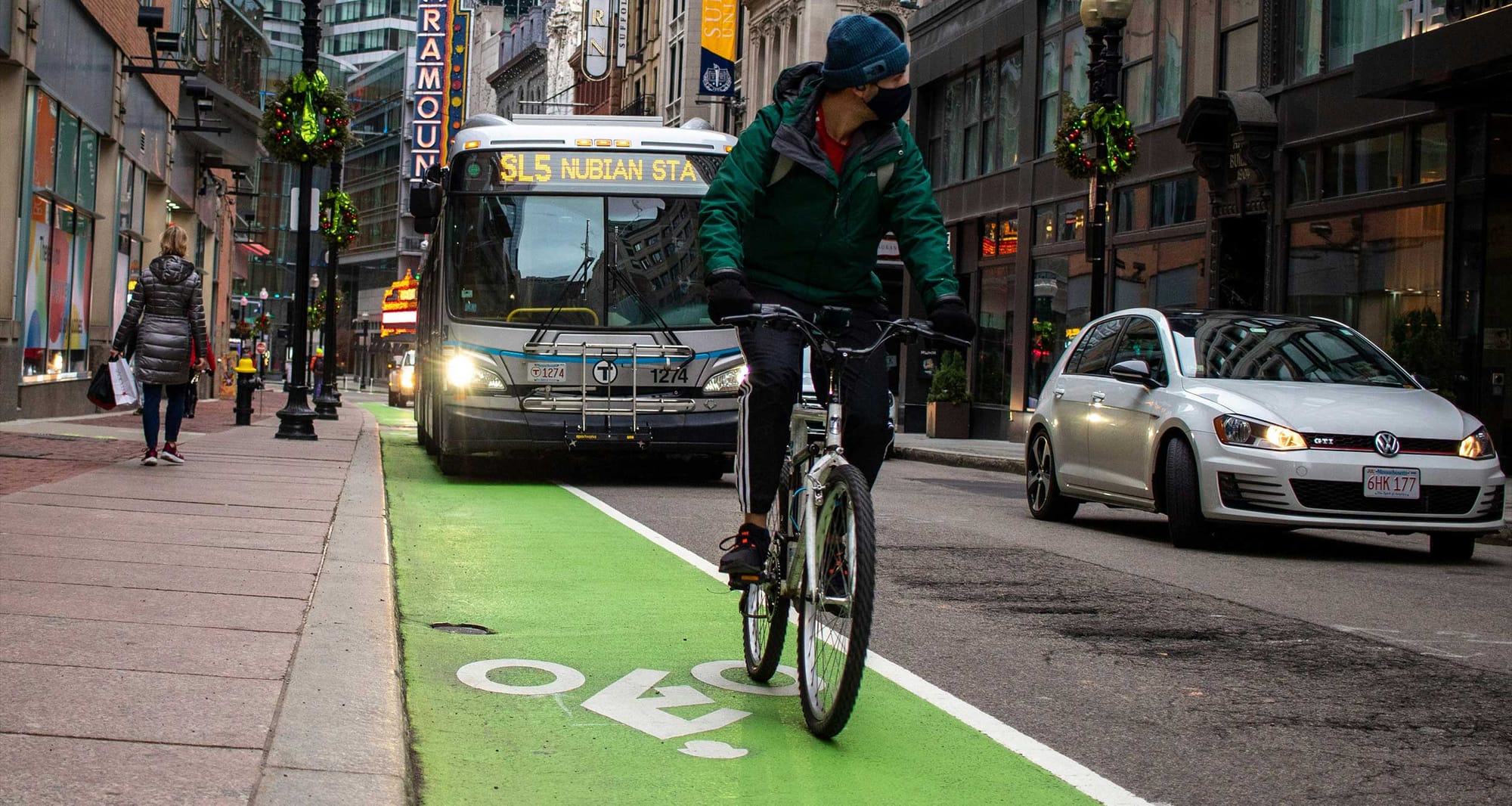 Sidewalk next to street and bike line in downtown.