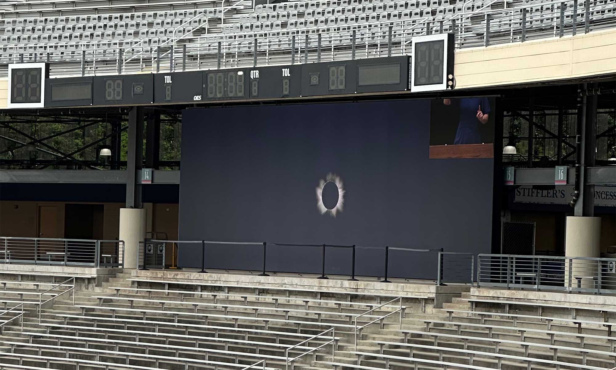 Hand of ASL interpreter cut off on video board.