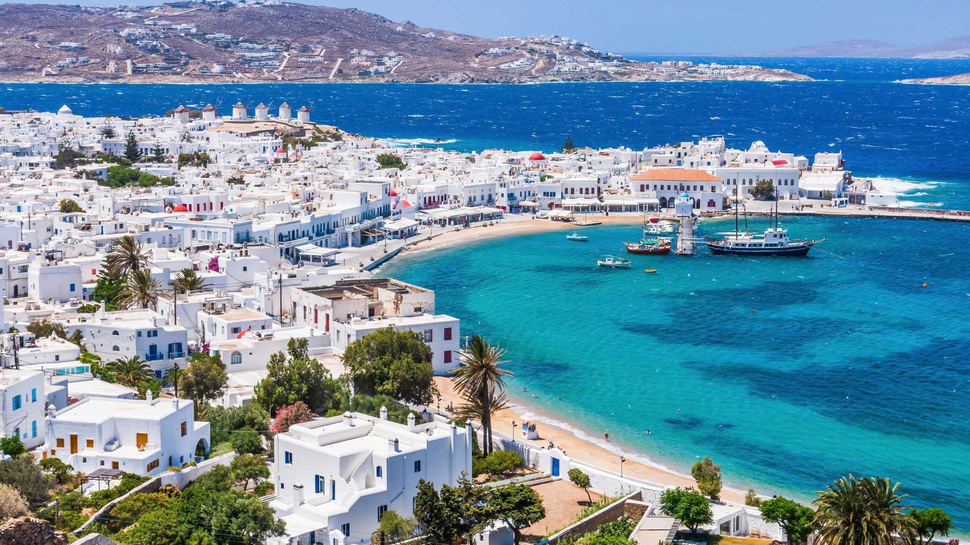 Aerial view of Mykonos beach and harbor.